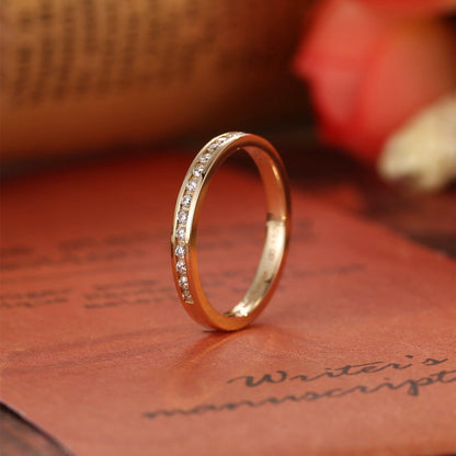 0.2 TCW Round Channel Setting Moissanite Wedding Band