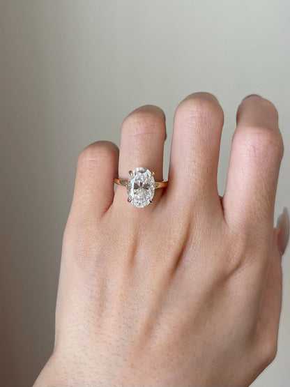 5 CT Oval Shaped Moissanite Engagement Ring In Hidden Halo Design