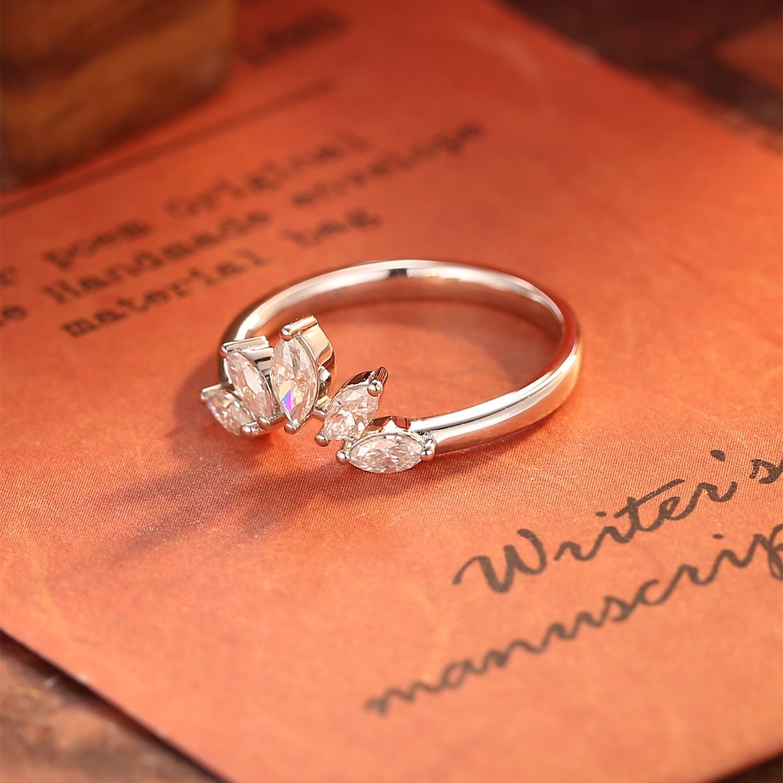 0.15 TCW Marquise Curved Moissanite Wedding Band