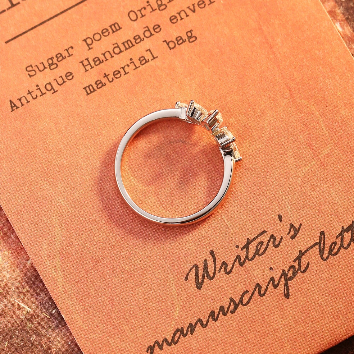0.15 TCW Marquise Curved Moissanite Wedding Band