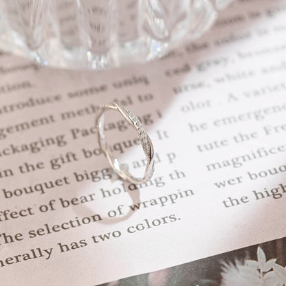 0.2 TCW Round Twisted Moissanite Wedding Band