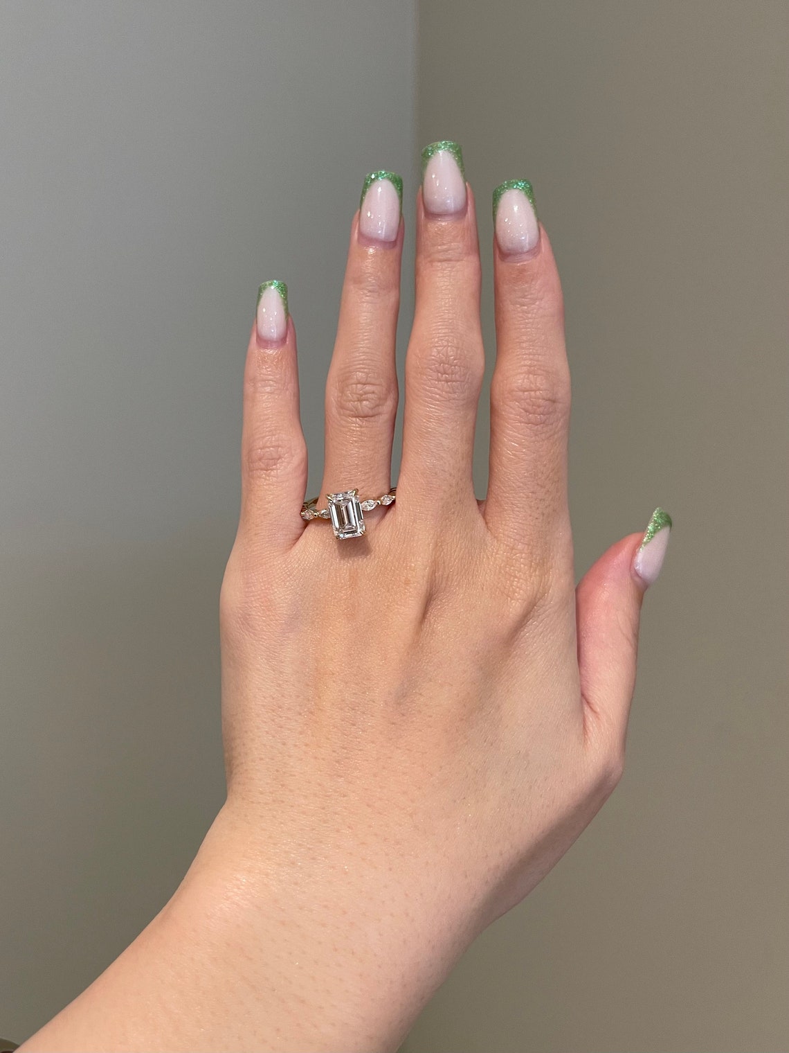 2.5 CT Emerald Shaped Moissanite Engagement Ring In Hidden Halo Design