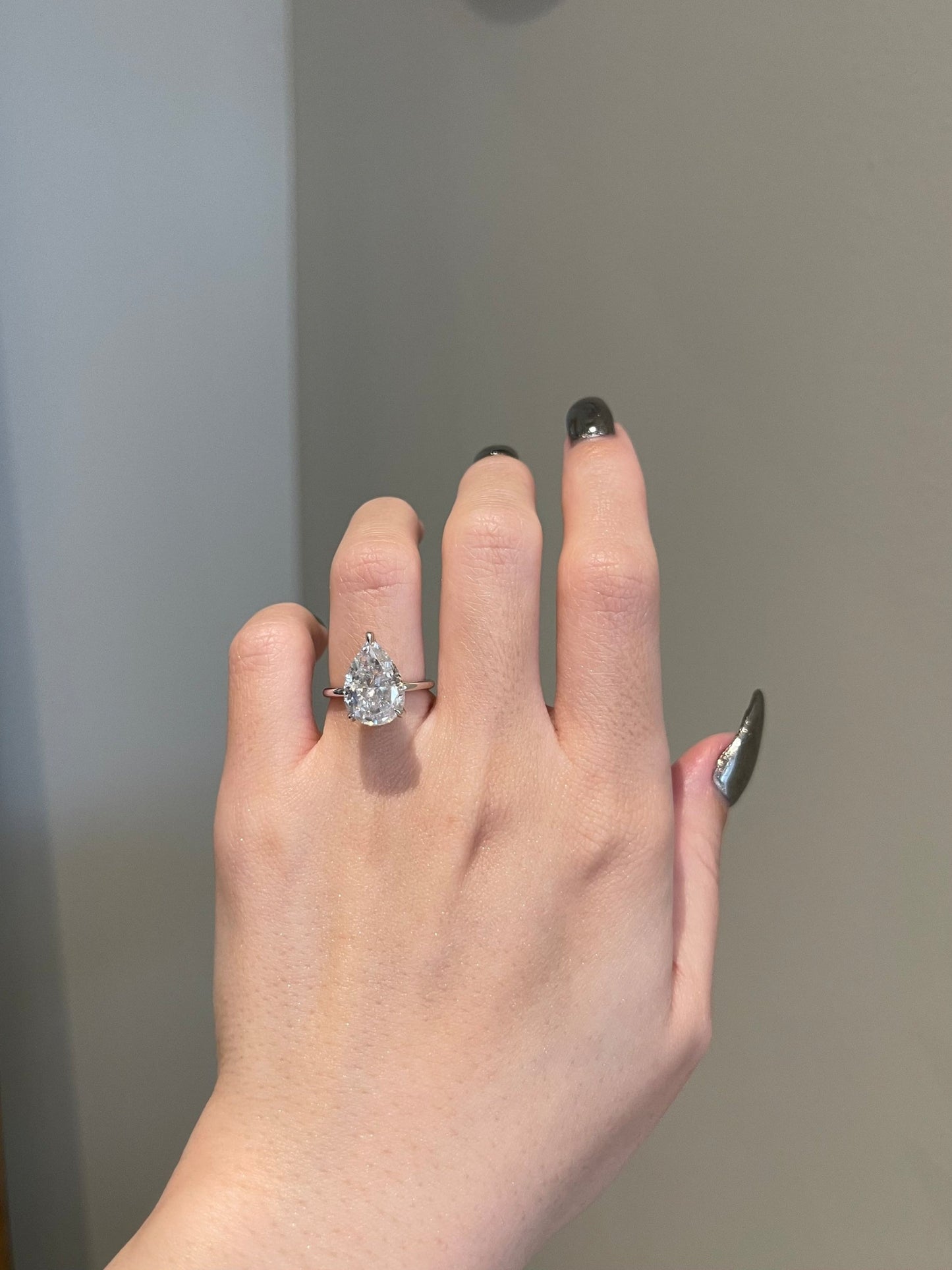 5 CT Pear Shaped Moissanite Engagement Ring In Hidden Halo Design