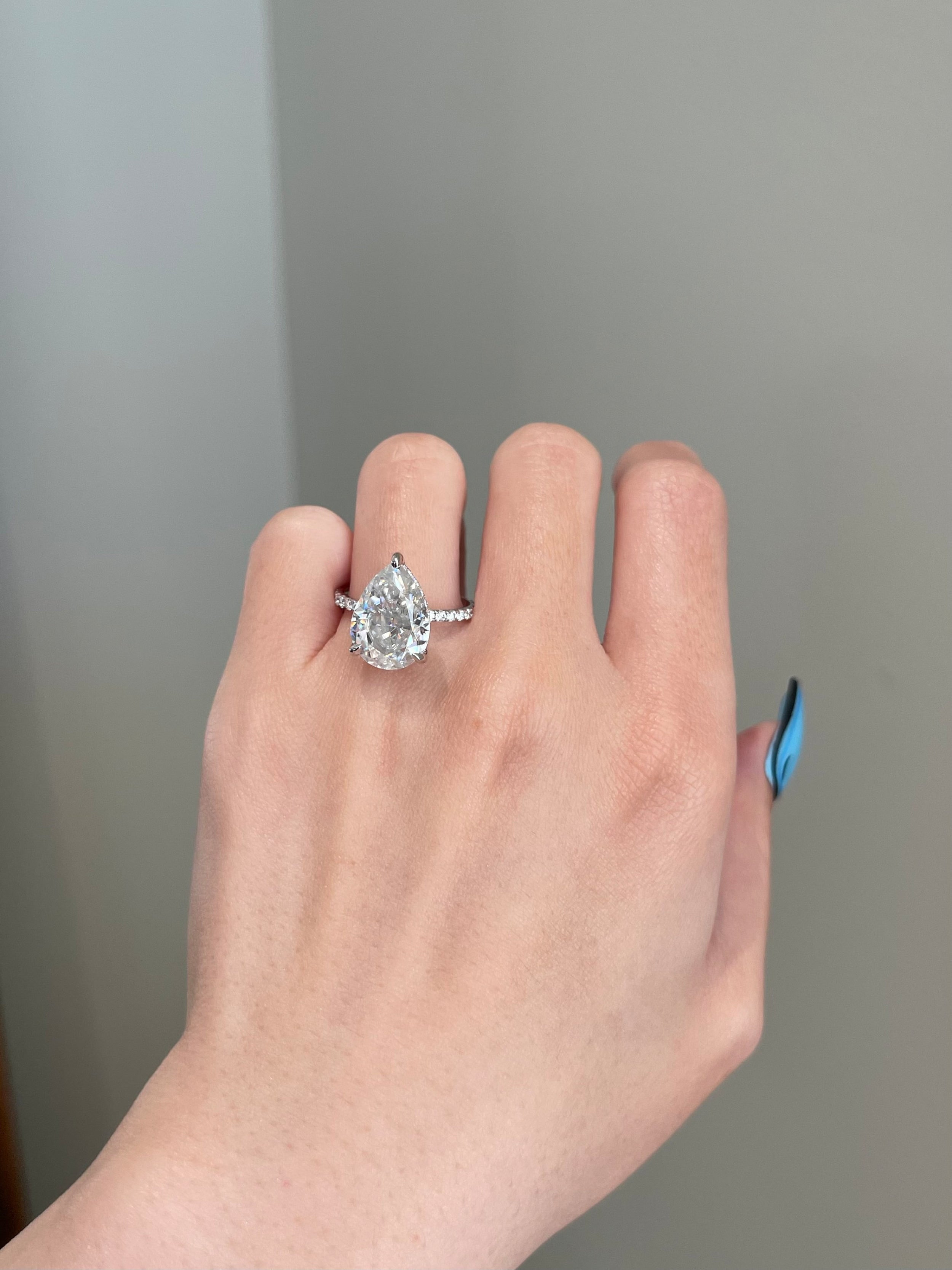 6.5 CT Pear Shaped Moissanite Engagement Ring In Pave Design