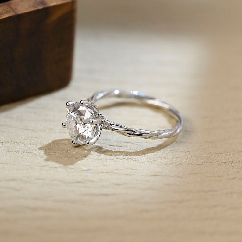 1 CT Round Solitaire & Twisted Shank Moissanite Engagement Ring