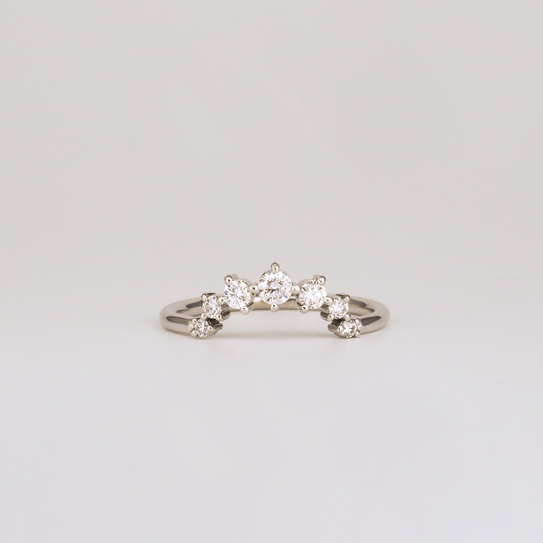 0.24 TCW Round Curved Moissanite Wedding Band